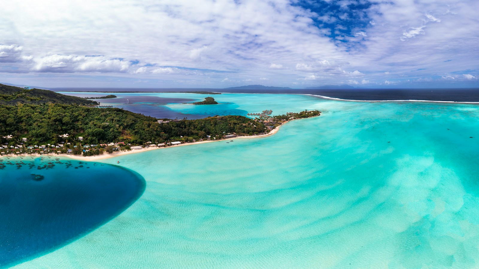 Aerial view over Bora Bora and its turquoise lagoon