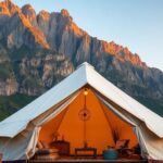 Luxurious glamping tent in a scenic natural setting.