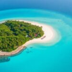 Aerial view of a beautiful private island getaway.