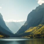 Mountain scenery with lush greenery and tranquil lake.