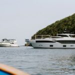 A couple of boats that are in the water