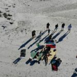 a group of people on a snowy mountain