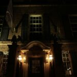 brown building during nighttime with lights