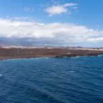 blue sea under blue sky during daytime