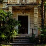 a building with palm trees