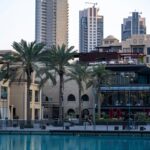 A large body of water surrounded by tall buildings