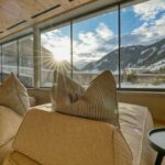 Relaxing lounge area with mountain view at sunrise