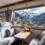 Luxury train carriage with Andean mountain views.