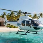 Helicopter approaching island villa over ocean