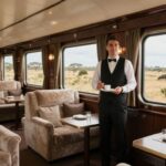 Rovos Rail private suite interior with safari windows and butler.