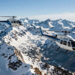 AW109 and H145 helicopters in the Alps.